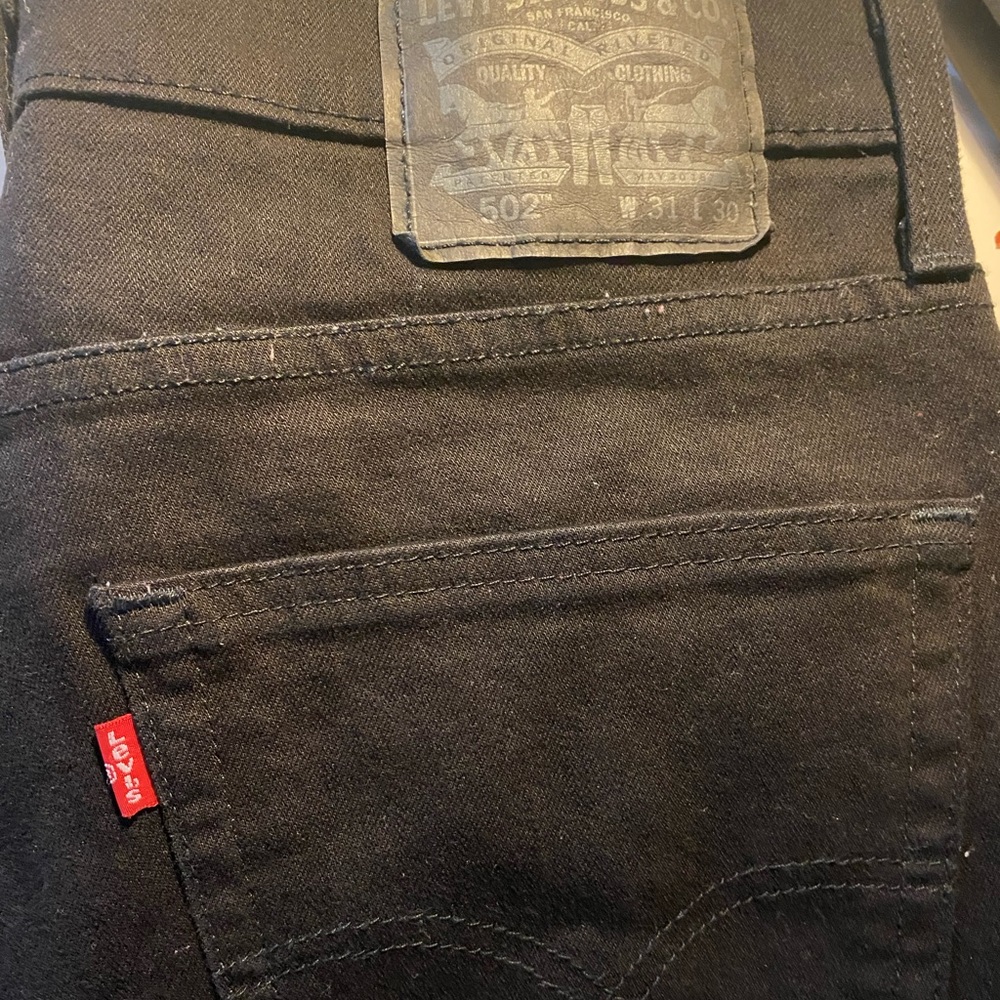 New solid black label Levi’s